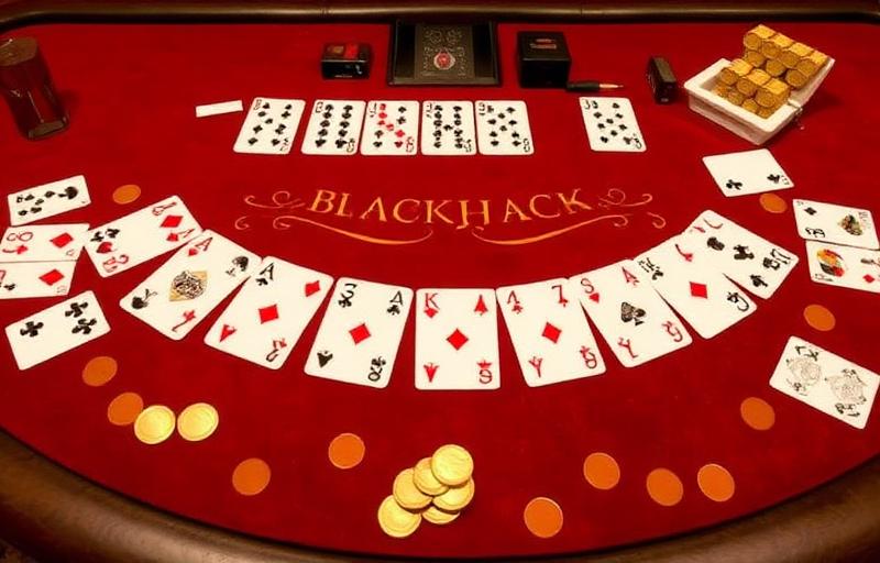 Multihand Blackjack game thumbnail with luxurious red velvet table, scattered playing cards and golden casino chips under neon lights